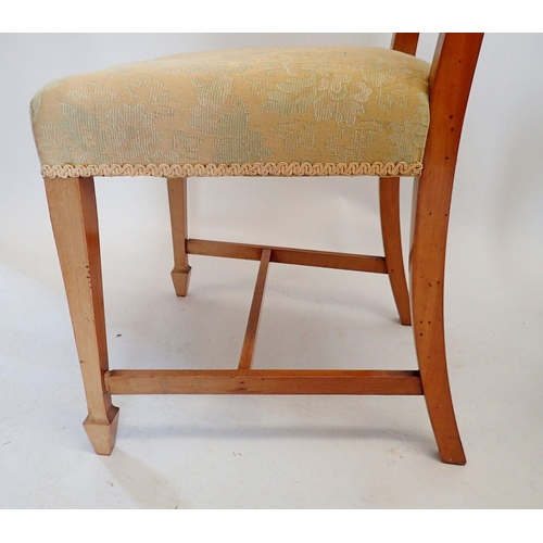 1436 - A pair of Edwardian satinwood slat back chairs on square tapered supports with spade feet