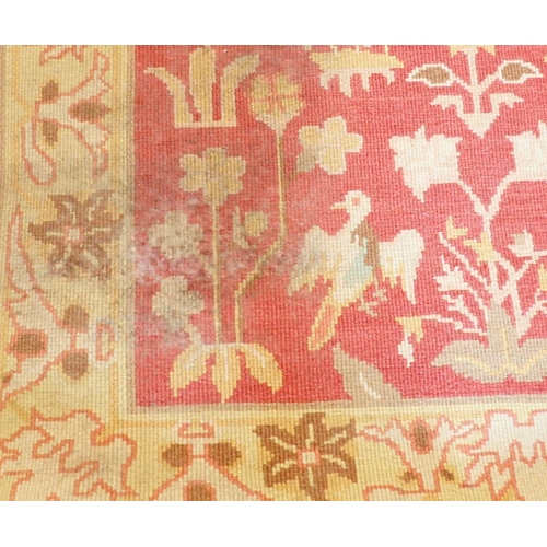 1441 - A Turkish style runner with floral design on coral ground, 271 x 93cm