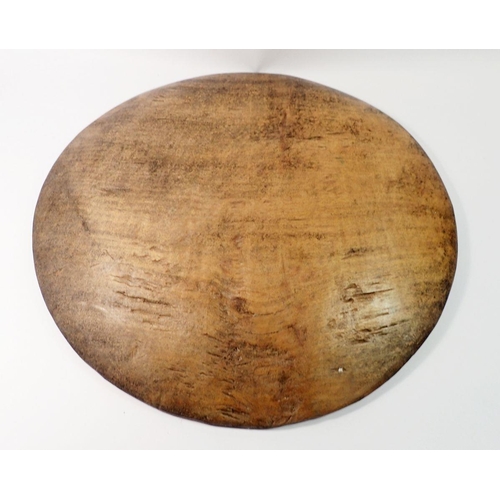 1442 - A large treen serving platter from Borneo, 53cm diameter