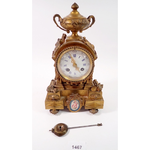 1467 - A 19th century French small gilt bronze mantel clock with Serves style porcelain panels and white en... 