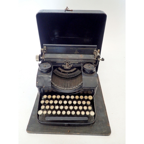 1469 - An old AMC typewriter, cased