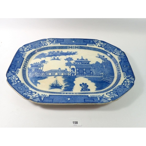 158 - A 19th century blue and white meat plate printed chinoiserie scene, 46cm wide