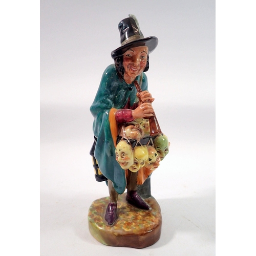 170 - A Royal Doulton figure 'The Mask Seller' HN2103