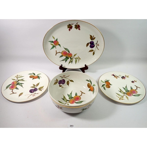 203 - A Royal Worcester Evesham serving bowl, two cake plates and a meat plate, 38cm