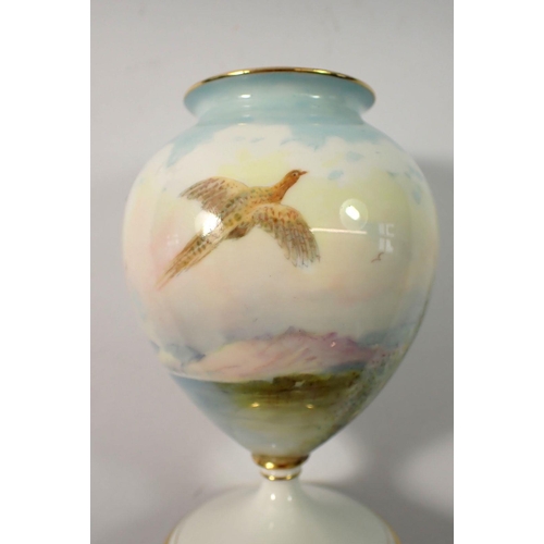 213 - A Minton vase painted pheasant by A Holland, 15cm tall