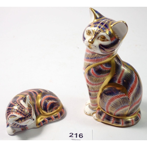 216 - Two Royal Crown Derby cat and kitten paperweights, 12.5cm tall