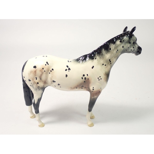 217 - A Royal Doulton Appaloosa horse, 19.5cm tall