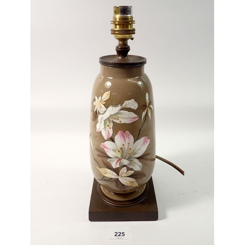 225 - A Victorian brown glass table lamp enamelled flowers, 31cm