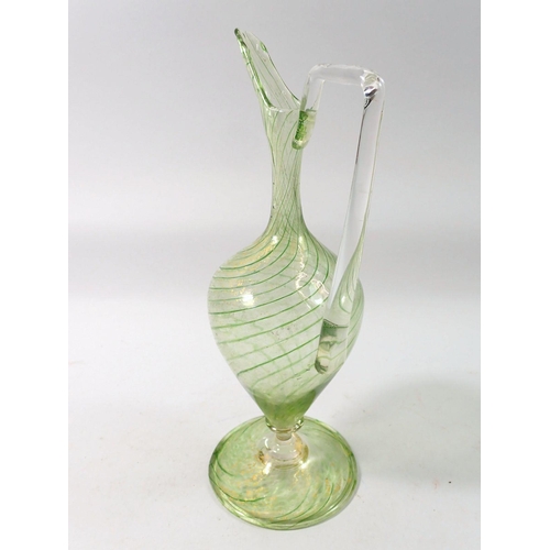 264 - A 19th century Salviati green glass ewer, 24cm tall