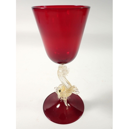 265 - A 20th century Salviati red goblet on dolphin stem, 21cm tall