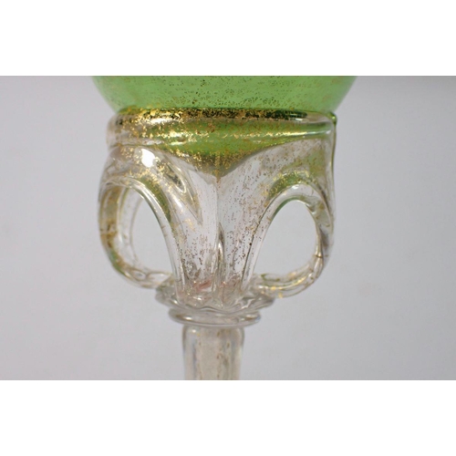 268 - A 19th century Salviati green glass goblet on openwork and tapered opaque hollow stem, 17cm tall