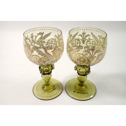 269 - A pair of 19th century Salviati wine glasses with enamelled dragon decoration - signed, 12cm tall