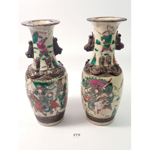 279 - A pair of Japanese crackle glaze vases decorated warriors, 25cm tall