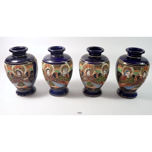 280 - A Japanese set of four late Satsuma vases painted seated figures, 19cm