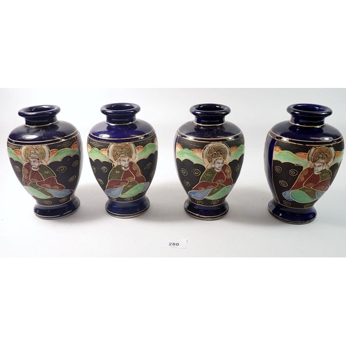 280 - A Japanese set of four late Satsuma vases painted seated figures, 19cm