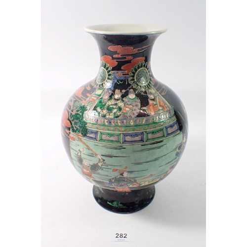 282 - A Chinese famille noir bulbous vase painted warriors attending a Royal Palace, 26cm