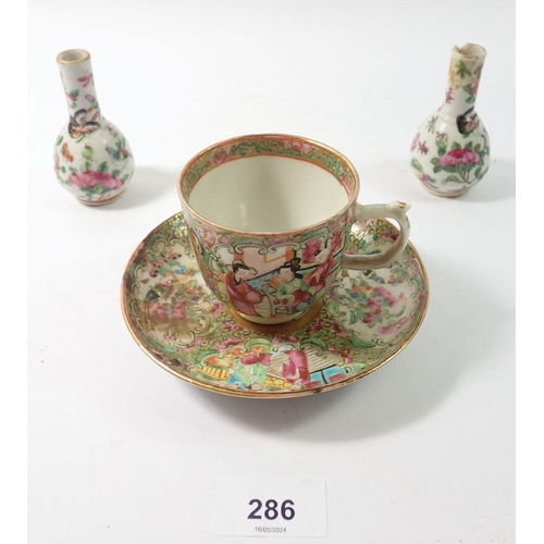 286 - A Chinese Canton cup and saucer and a pair of miniature vases