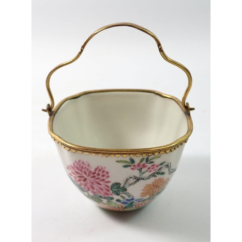 288 - A late 18th century Japanese Kakiemon bowl with European gilded metal mounts and handle, 8.5cm wide