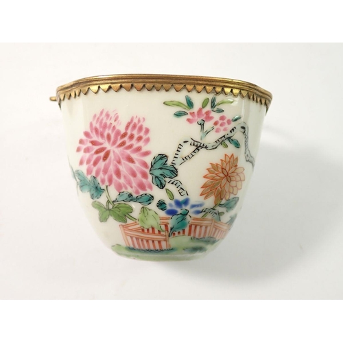 288 - A late 18th century Japanese Kakiemon bowl with European gilded metal mounts and handle, 8.5cm wide