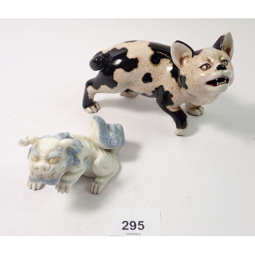 295 - A Japanese porcelain model cat, 13cm and a Kylin dragon