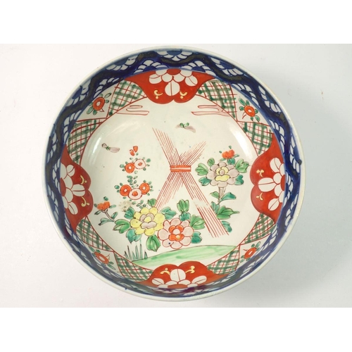 299 - A Japanese Imari fruit bowl with floral decoration, 24cm diameter