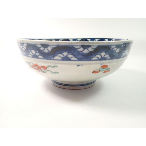 299 - A Japanese Imari fruit bowl with floral decoration, 24cm diameter