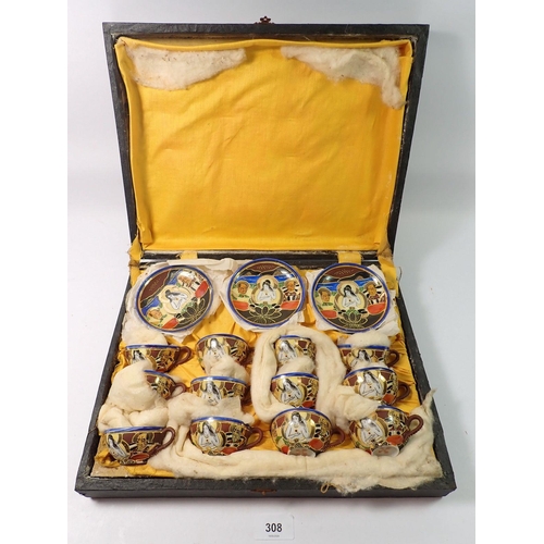 308 - A Japanese eggshell tea set comprising twelve small cups and saucers, in fitted case (one cup a/f)