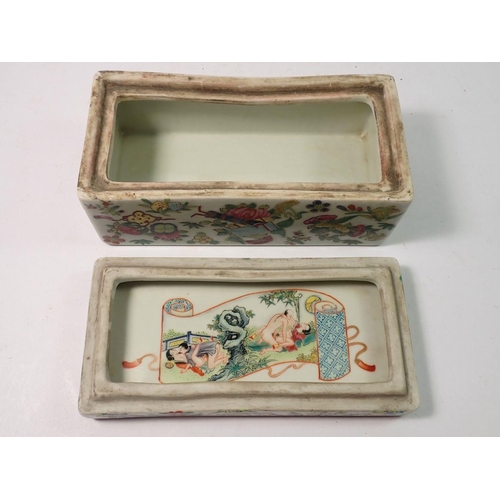 310 - A Chinese 19th century Canton famille rose rectangular box and lid decorated court ladies and offici... 