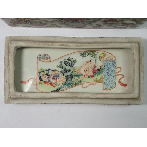 310 - A Chinese 19th century Canton famille rose rectangular box and lid decorated court ladies and offici... 