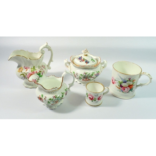 32 - A Victorian floral painted milk and covered sugar with similar jug, a large tankard and a child's mu... 