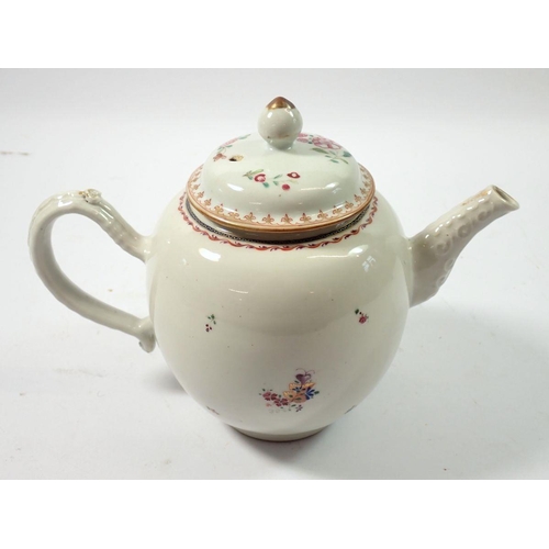 354 - A Chinese famille rose teapot painted sprigs of flowers, 17cm tall