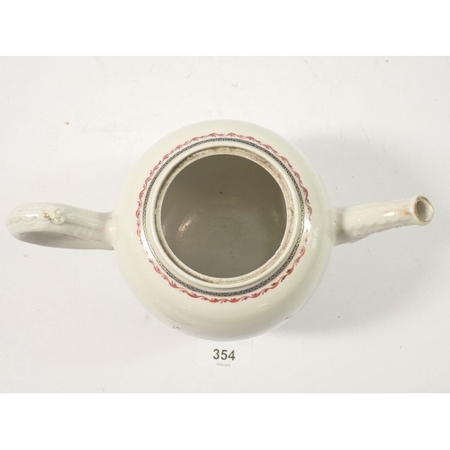 354 - A Chinese famille rose teapot painted sprigs of flowers, 17cm tall