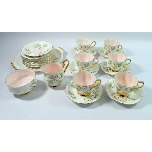 45 - A Royal Albert Braemer tea service comprising six cups and seven saucers, nine tea plates, cake plat... 