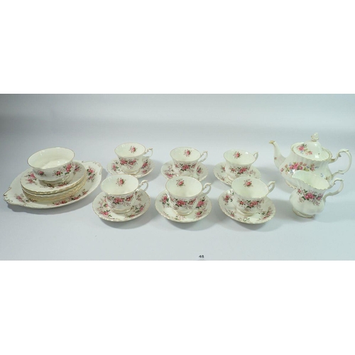 48 - A Royal Albert tea service Lavender Rose including six cups and saucers, six tea plates, cake plate,... 