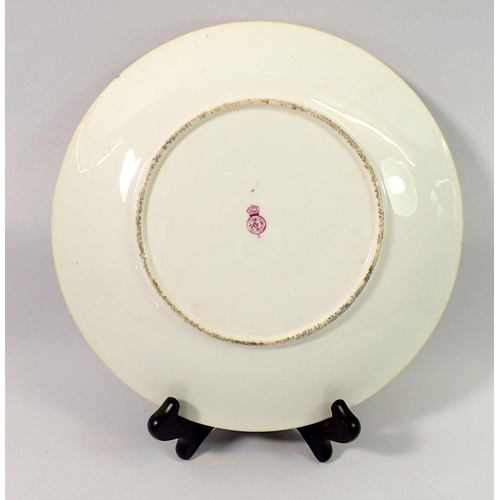 62 - A Royal Worcester plate painted Scotsman and two ponies, with hairline crack, 23cm diameter