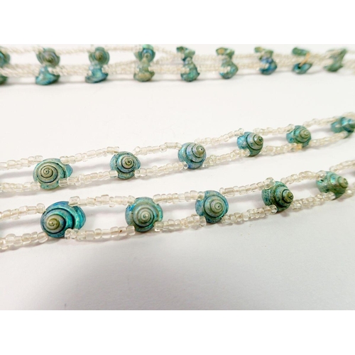 676 - A blue shell and bead antique necklace, 112cm long