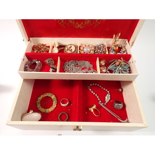 687 - A jewellery box of costume jewellery including silver St Christopher and chain