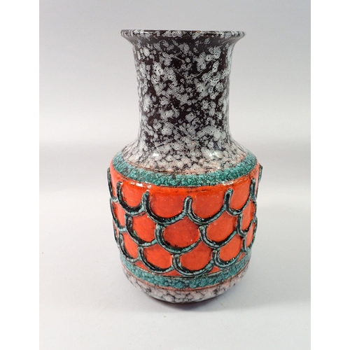 69 - A West German Studio vase with orange, black and white mottled decoration, 25cm tall