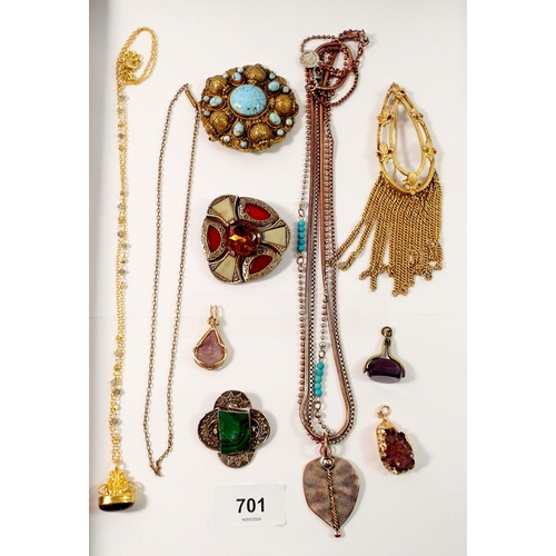 701 - A box of costume jewellery including Miracle brooch, stone set jewellery etc.