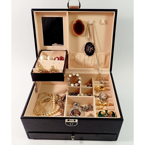 711 - A leather clad jewellery box and contents of costume jewellery