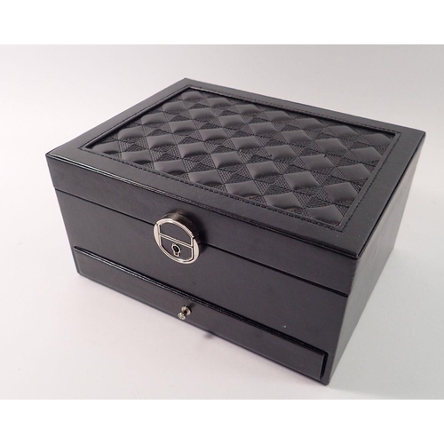 711 - A leather clad jewellery box and contents of costume jewellery