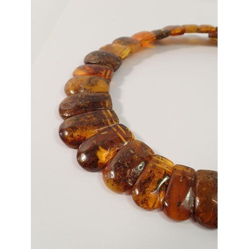 717 - A Baltic amber collar link necklace, 64g, clasp a/f