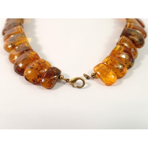 717 - A Baltic amber collar link necklace, 64g, clasp a/f