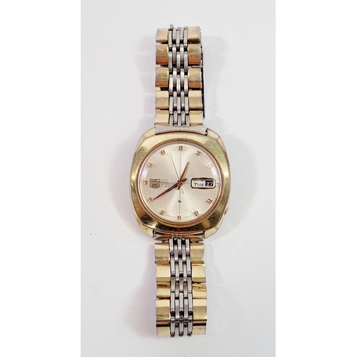 730 - A Seiko 5 gents automatic wristwatch with cushion shaped face on a gold plated strap