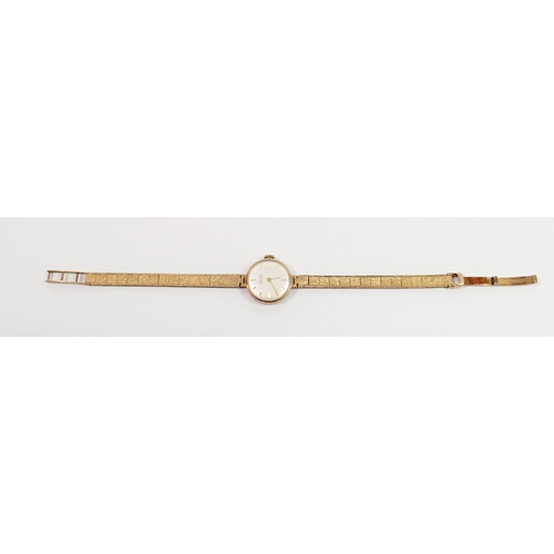 737 - A 9 carat gold Vertex Revue ladies vintage watch on 9 carat gold strap, 16.5g