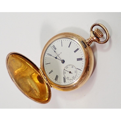 739 - An Elgin gold plated pocket watch with engraved bird and foliage decoration