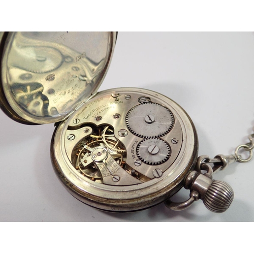 743 - A silver pocket watch by Thomas Russell & Son Birmingham 1916 and a silver fob chain with coin, chai... 