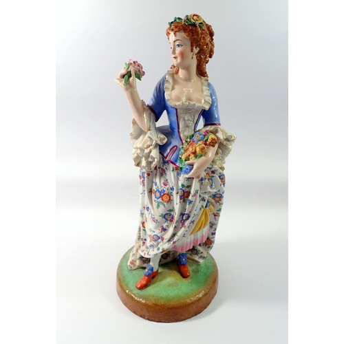 78 - A 19th century French porcelain large figure of a woman with flowers, 44cm tall