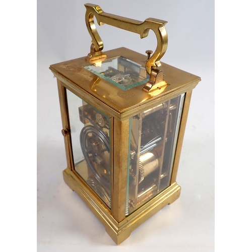 899 - A brass carriage clock retailed by Marcks & Co Ltd, Bombay, presented to Mr Chatterton in Nagpur 192... 