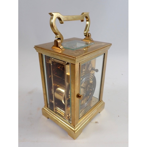 899 - A brass carriage clock retailed by Marcks & Co Ltd, Bombay, presented to Mr Chatterton in Nagpur 192... 